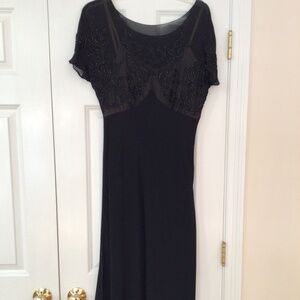 Beautiful ankle length beaded top dress in black.  Stunning.